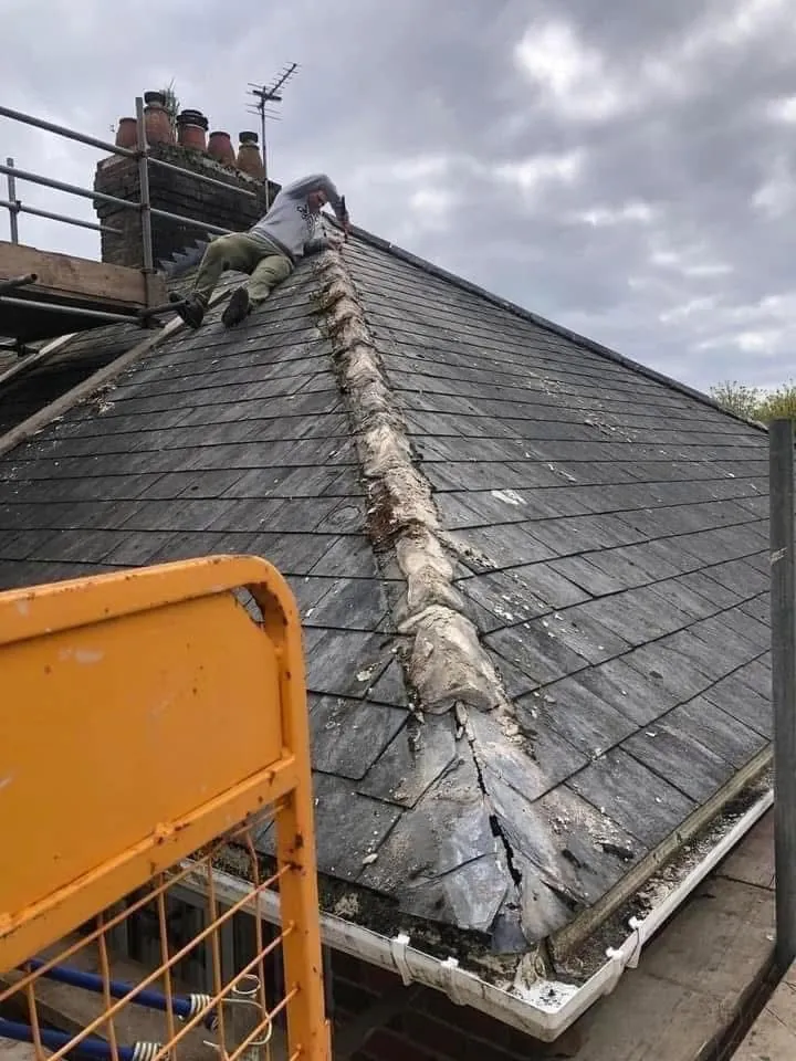 Slate roof ridge and chimney repair in Northam